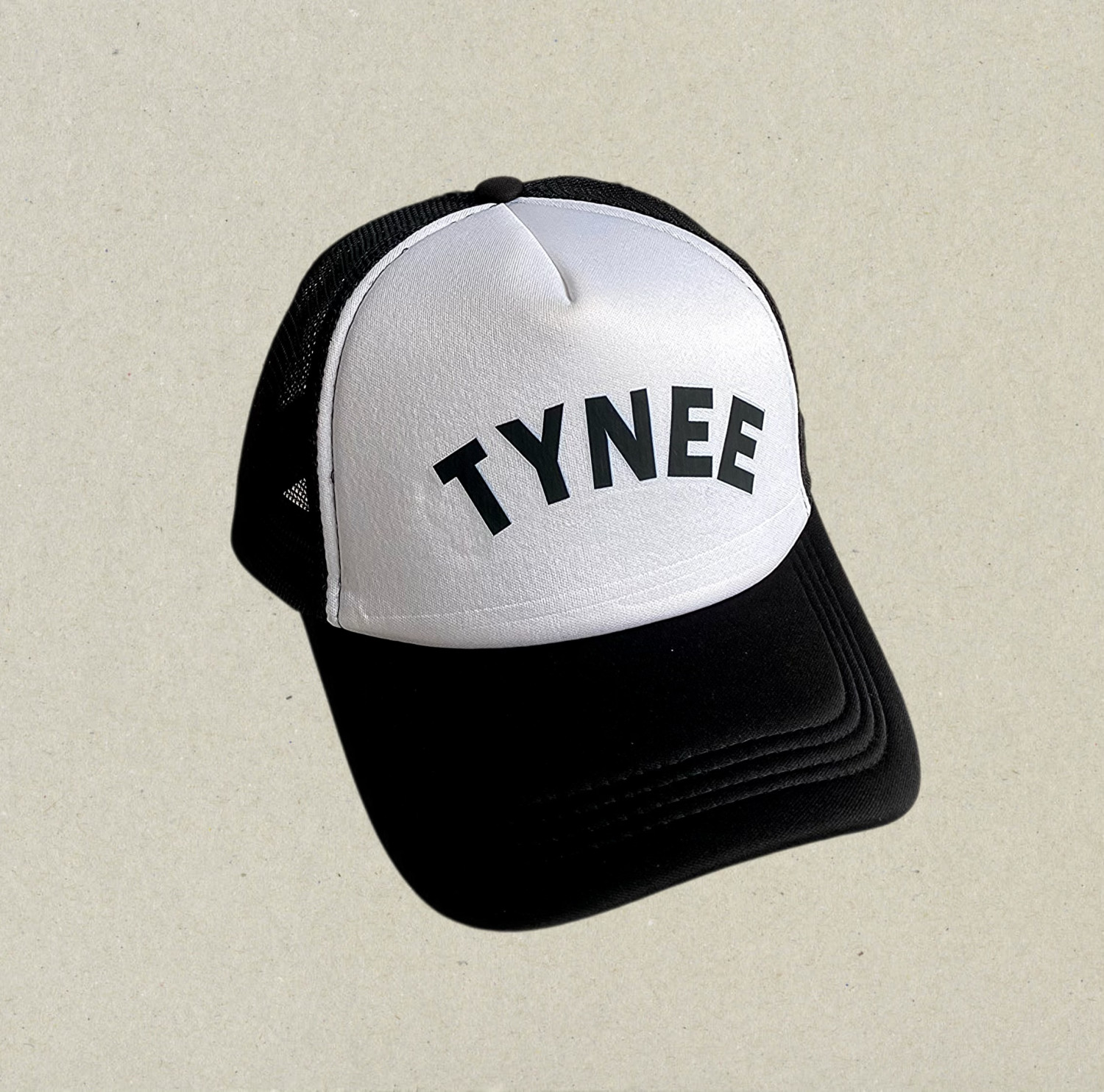 TYNEE (Bold) Trucker hat